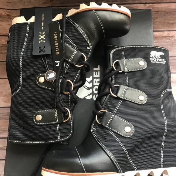sorel joan of arctic wedge mid